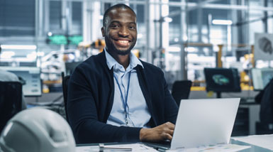 Man Sitting at Computer